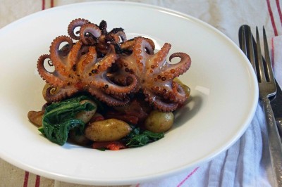 Grilled Octopus with Roasted Tomatoes, Potatoes & Chard